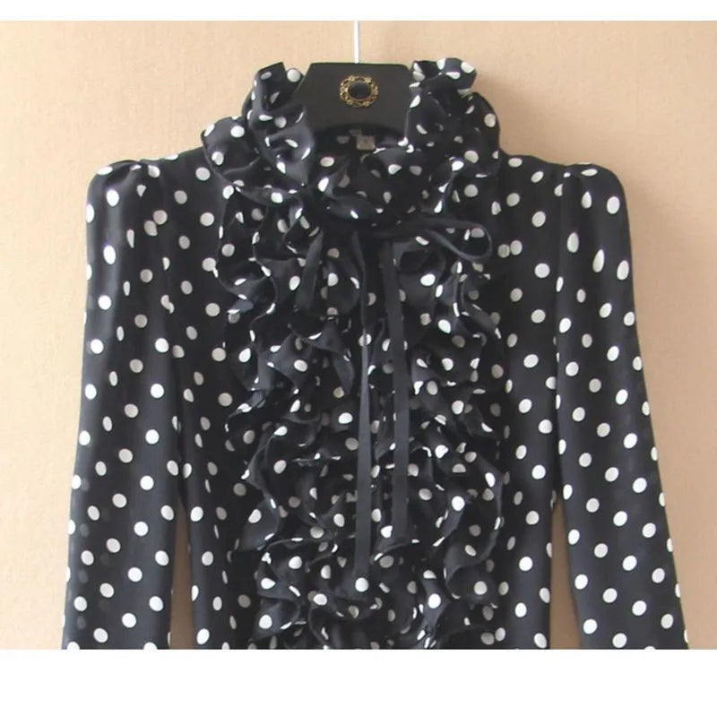 Black polka dot bodycon dress for women from Corporación Turística, close-up of fitted, stylish dress with moon print details.