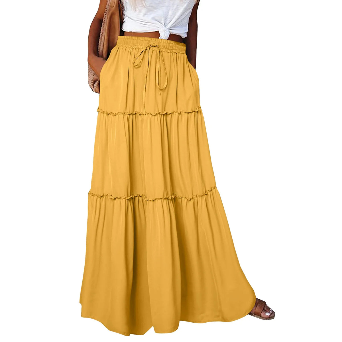 Long solid-colored women's skirt with elastic waistband, by Corporación Turística, shown in a stylish, flowing design.