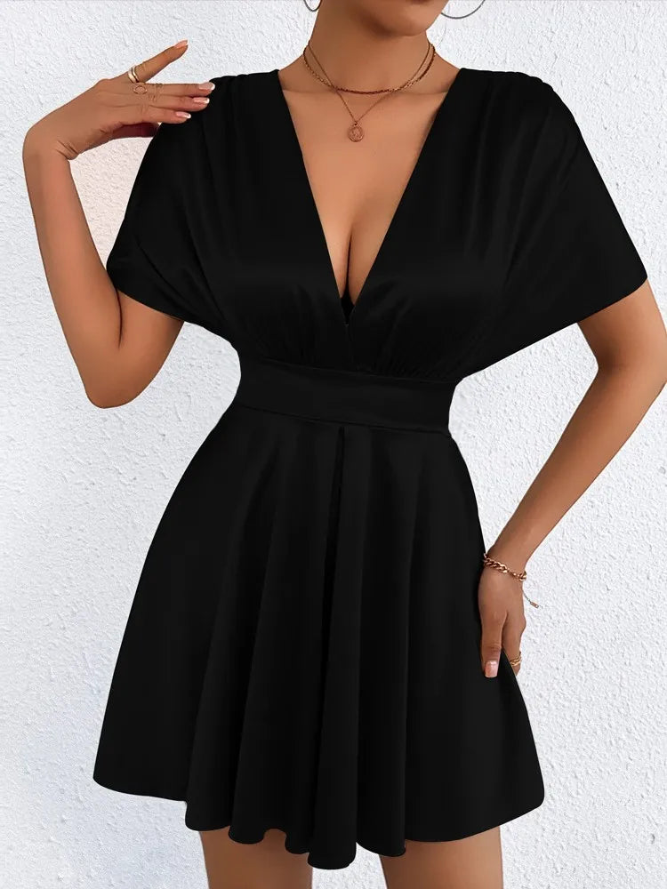 Elegant sexy dress with V-neck and low waist from Corporación Turística, showcasing a fitted, stylish silhouette.