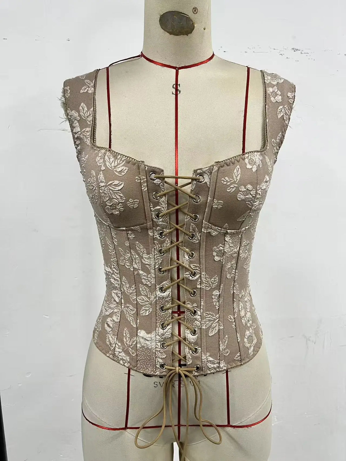 Retro floral jacquard top corset for women with straps, featuring intricate design and structured fit by Corporación Turística.