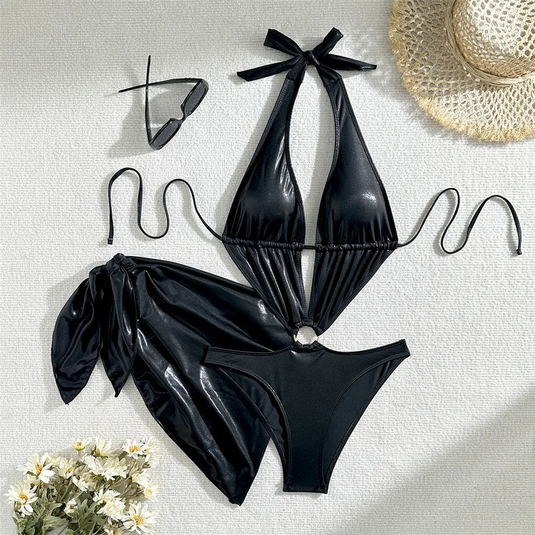 Sparkling glittering deep V neck sarong swimsuit by Corporación Turística, featuring shimmering fabric and stylish design.