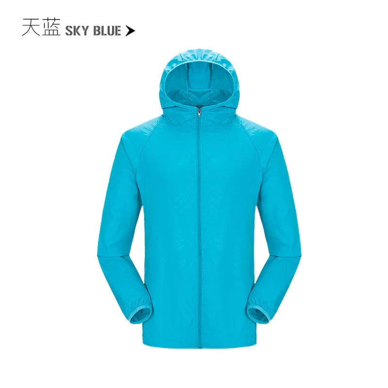 Waterproof camping rain jacket for men and women by Corporación Turística, lightweight outdoor rainwear with hood and adjustable cuffs.