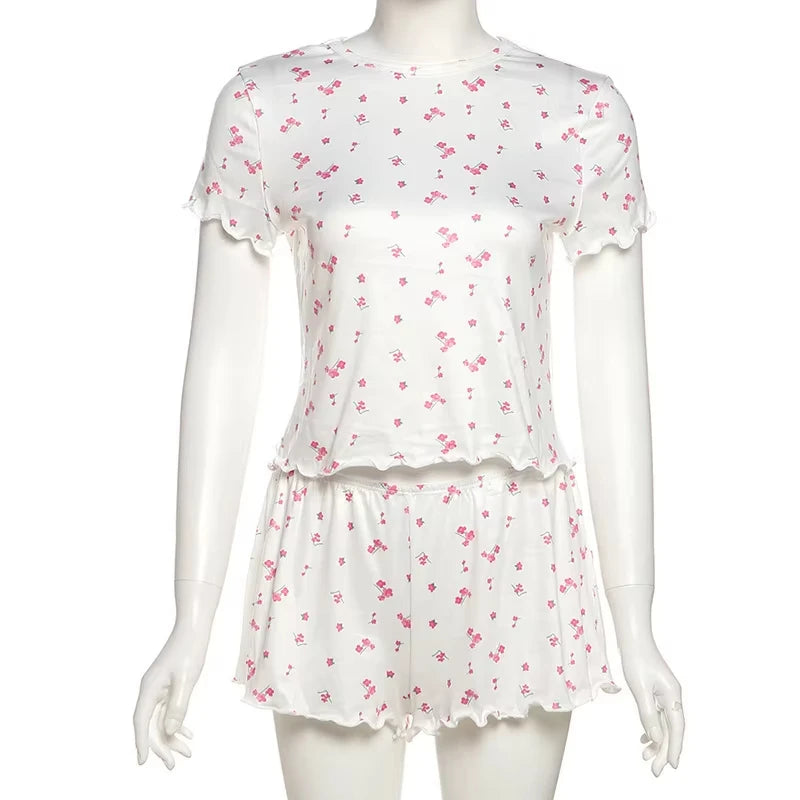 Two-piece floral autumn pajamas set for women by Corporación Turística, featuring a cozy top and matching pants.