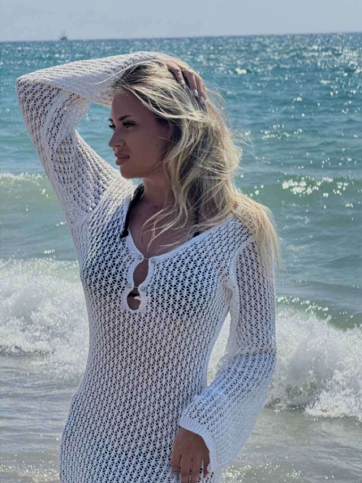 Casual short vacation dress from Corporación Turística, lightweight and flowing with a relaxed fit, perfect for warm weather.