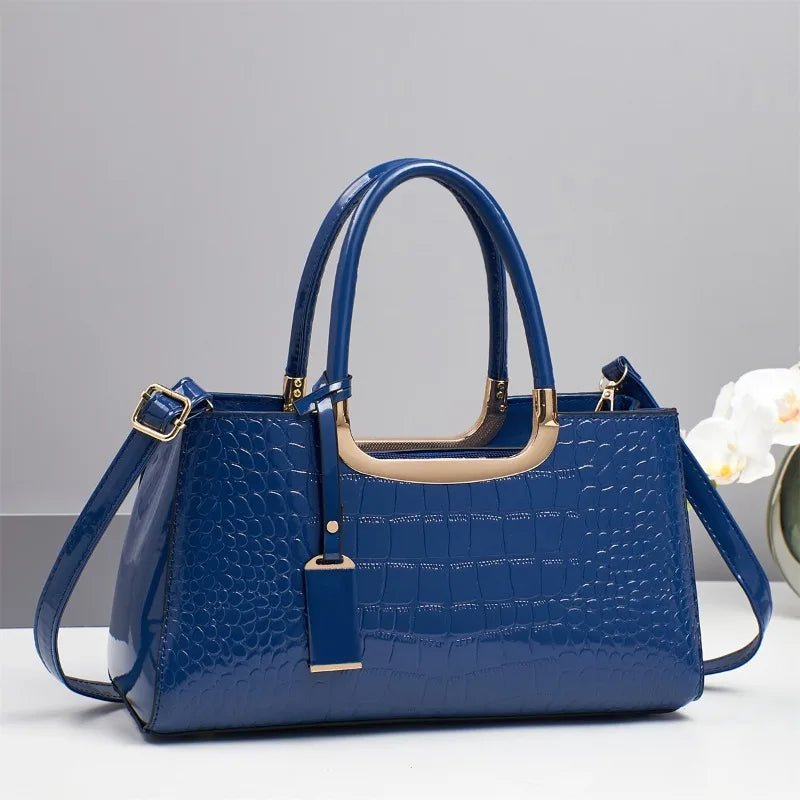 Western-style women's shoulder bag by Corporación Turística, featuring brown leather and decorative accents.