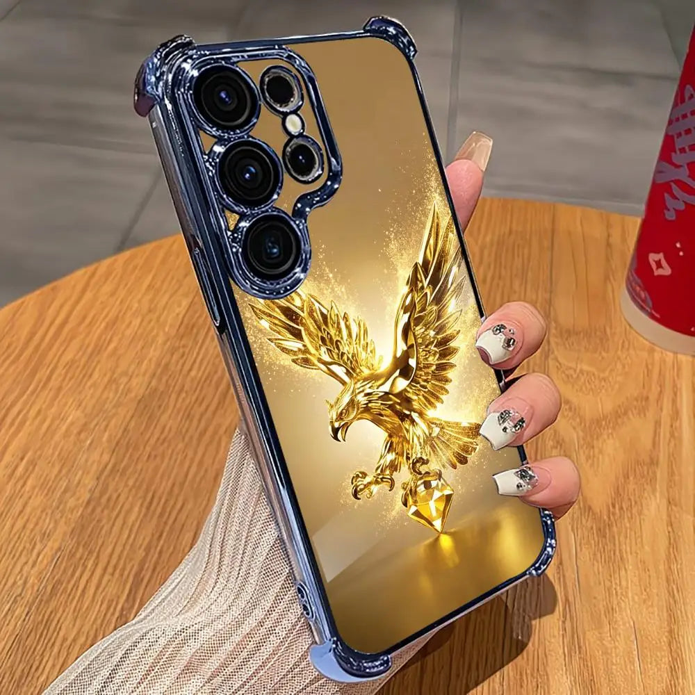 Golden eagle design phone case for smartphones, featuring a shiny, metallic finish and detailed eagle artwork.