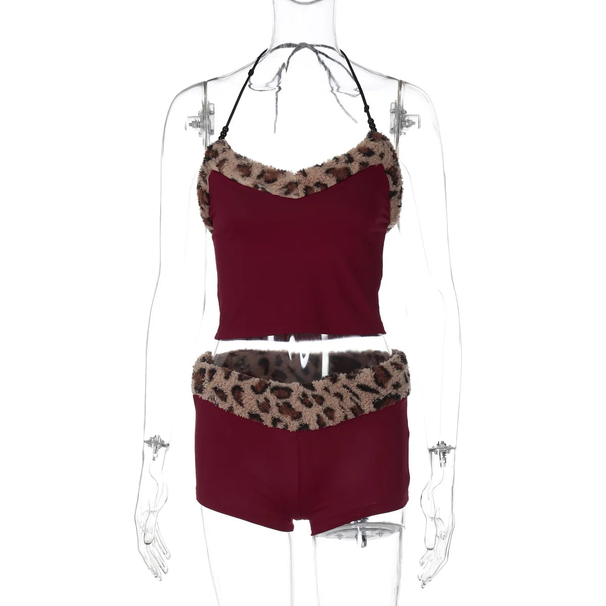 Two-piece matching set with sling by Corporación Turística, featuring coordinated fashion in a stylish design.