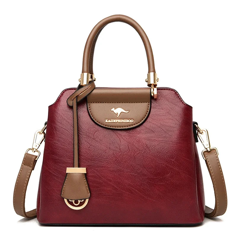 Small leather crossbody bag for women by Corporación Turística, featuring a compact design and adjustable strap.