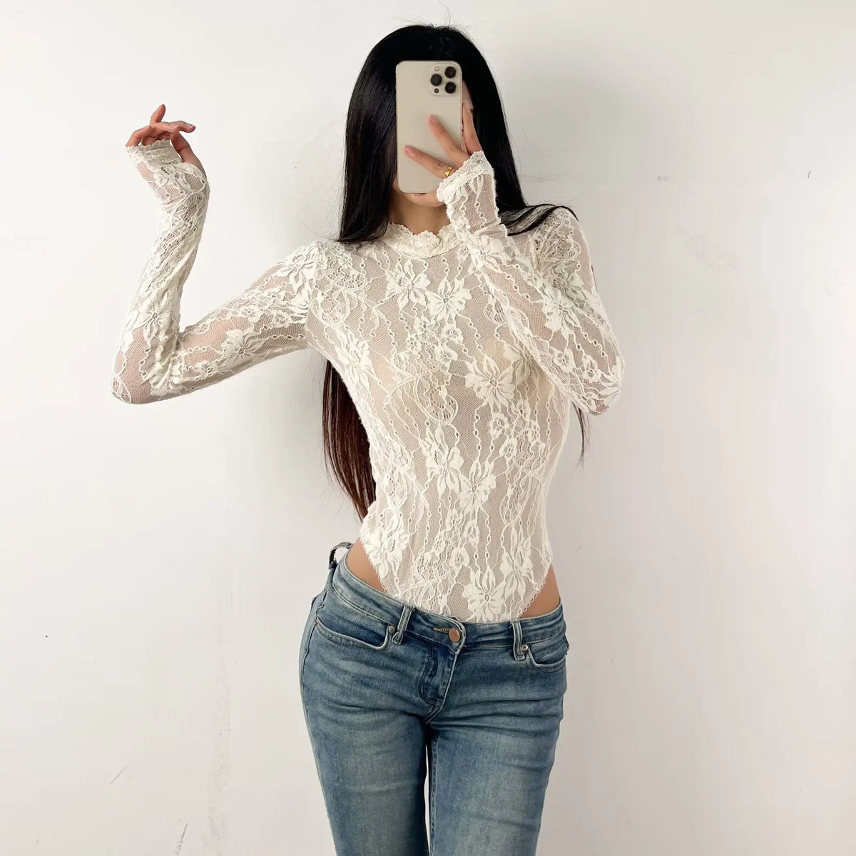 Women’s nude body with high neck and long sleeves, from Corporación Turística, shown in a close-up image.
