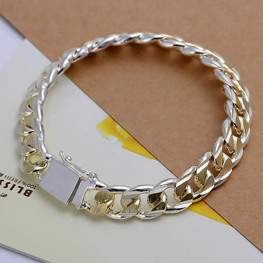 Solid 925 silver chain bracelet from Corporación Turística, featuring 8-10mm links, displayed on a neutral background.