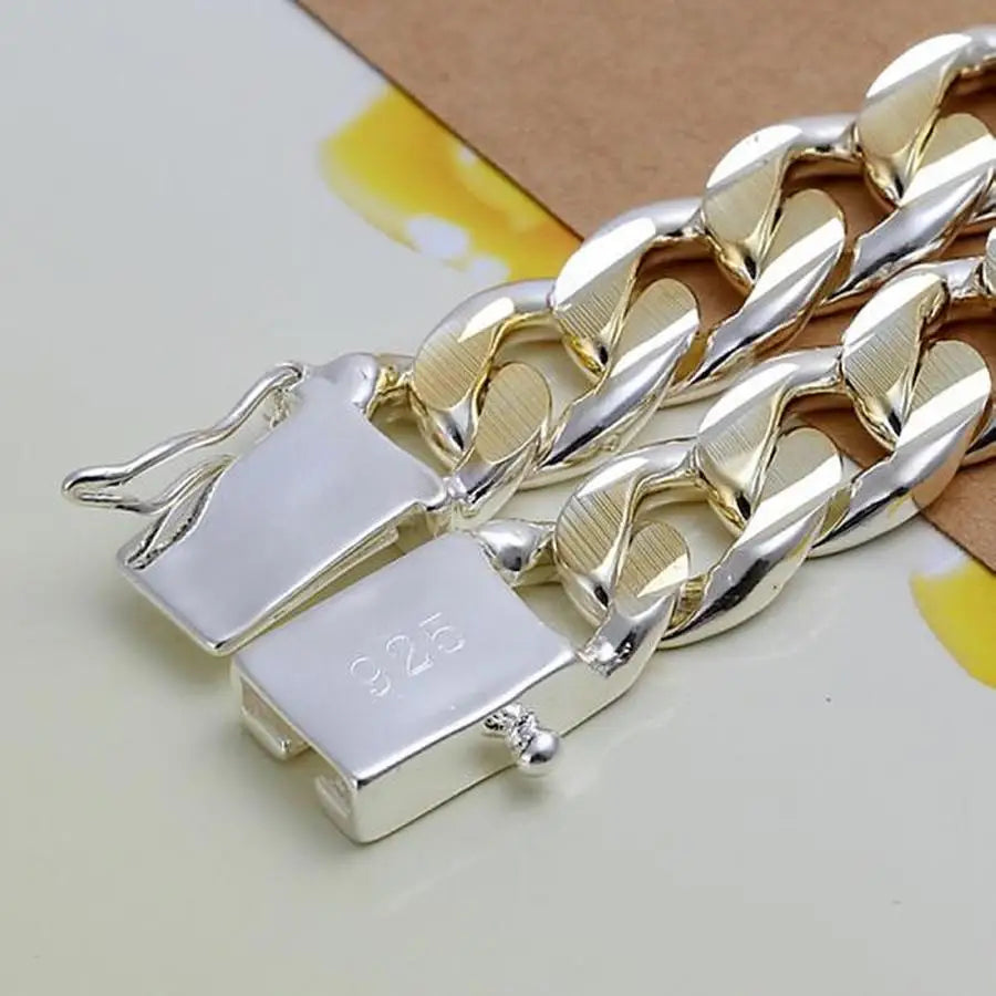 Solid 925 silver chain bracelet with 8-10mm links, featuring a sleek design, perfect for everyday wear.