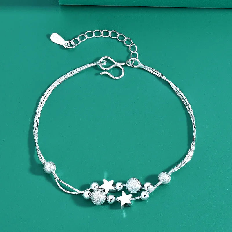 Silver 925 bracelets for women and men, featuring sleek, polished designs with adjustable clasps, by Corporación Turística.
