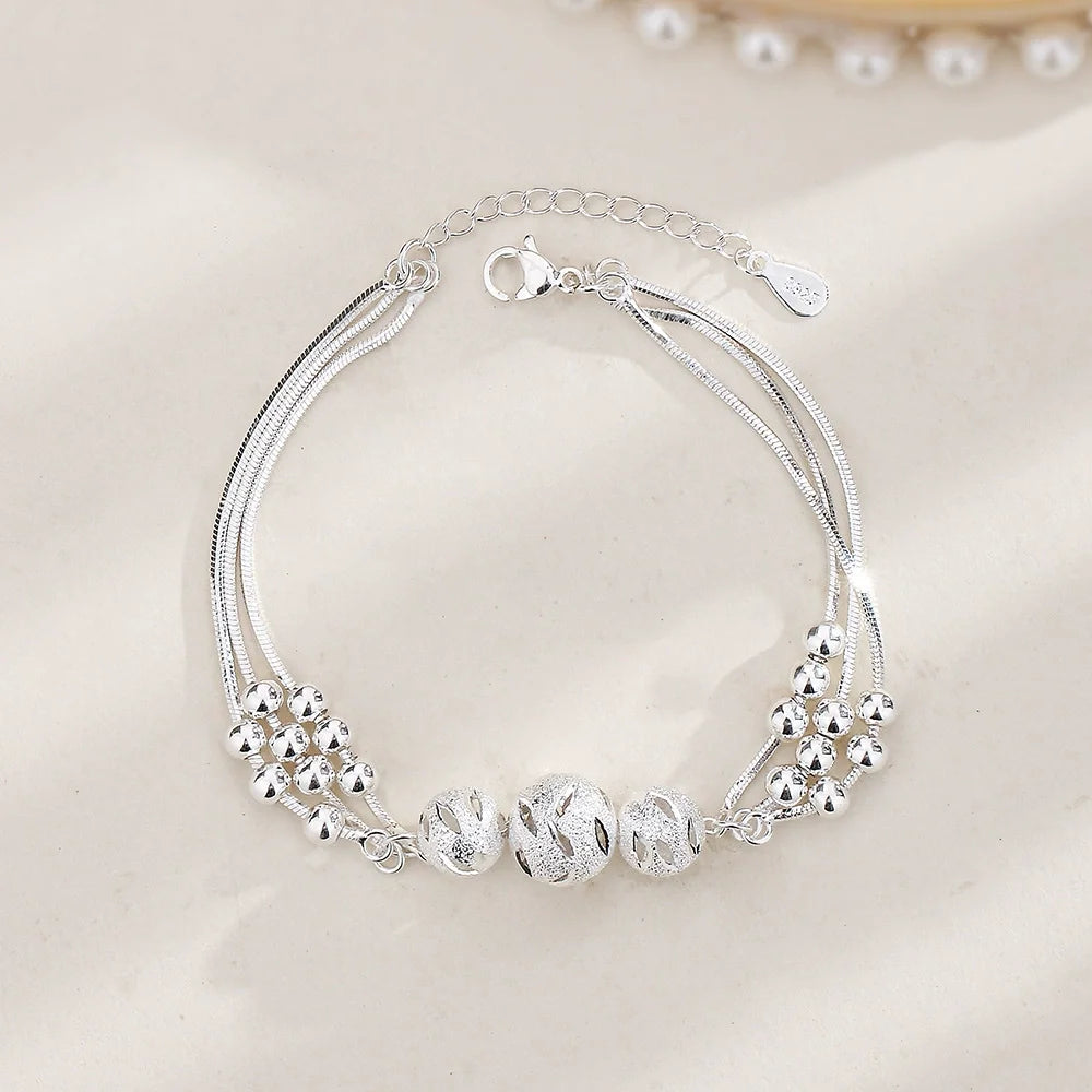 Sterling silver 925 bracelets for women and men, featuring sleek designs and polished finishes, ideal for everyday wear.