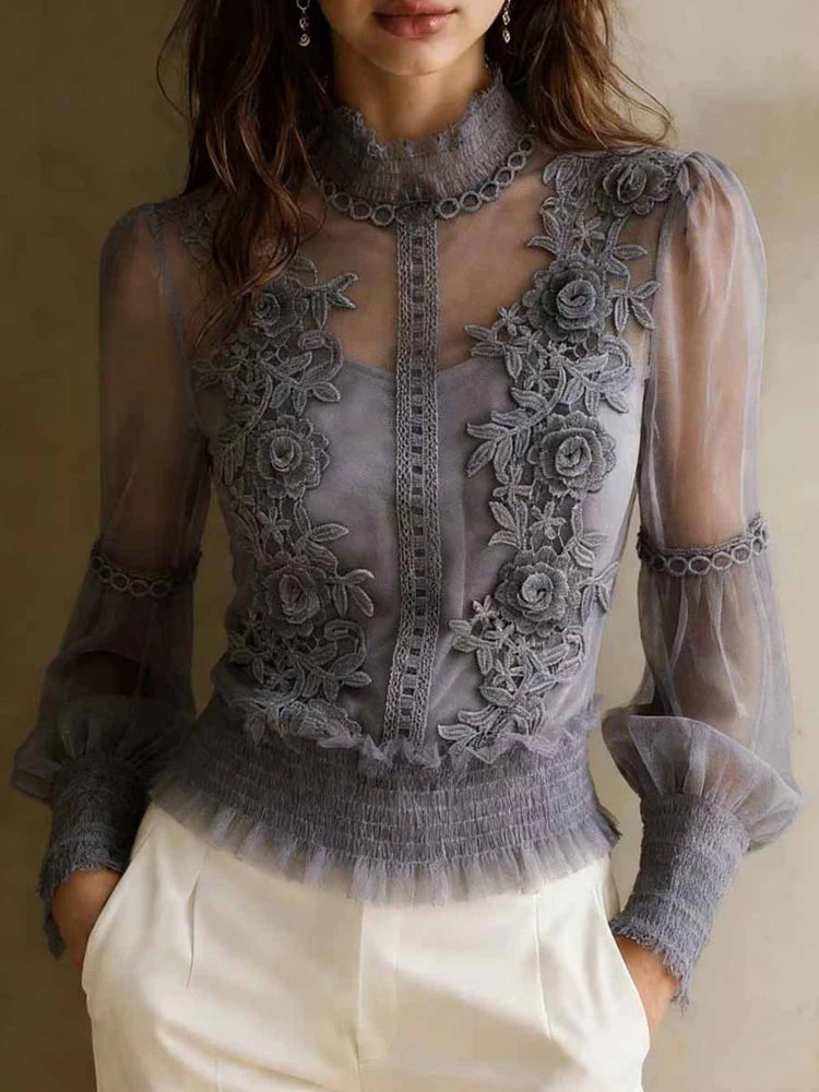 Elegant solid-colored blouse for spring and summer by Corporación Turística, shown in grey with a relaxed fit.