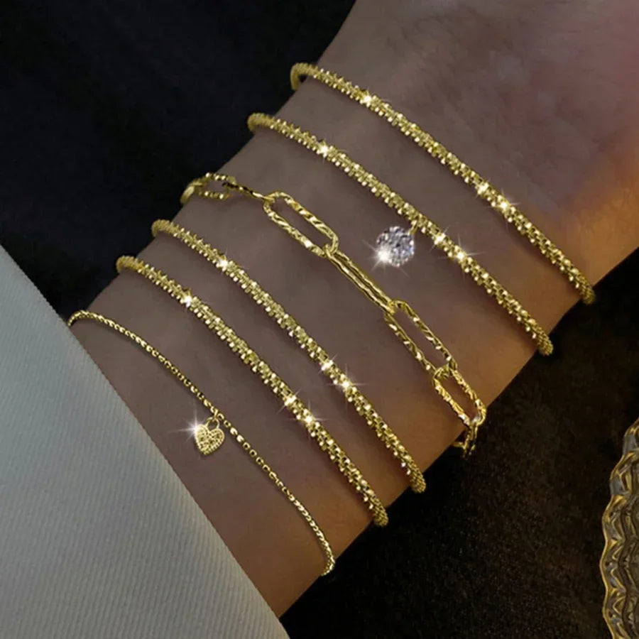 Six imitation diamond silver bracelets from Corporación Turística, featuring sparkling cubic zirconia accents and sleek silver design.