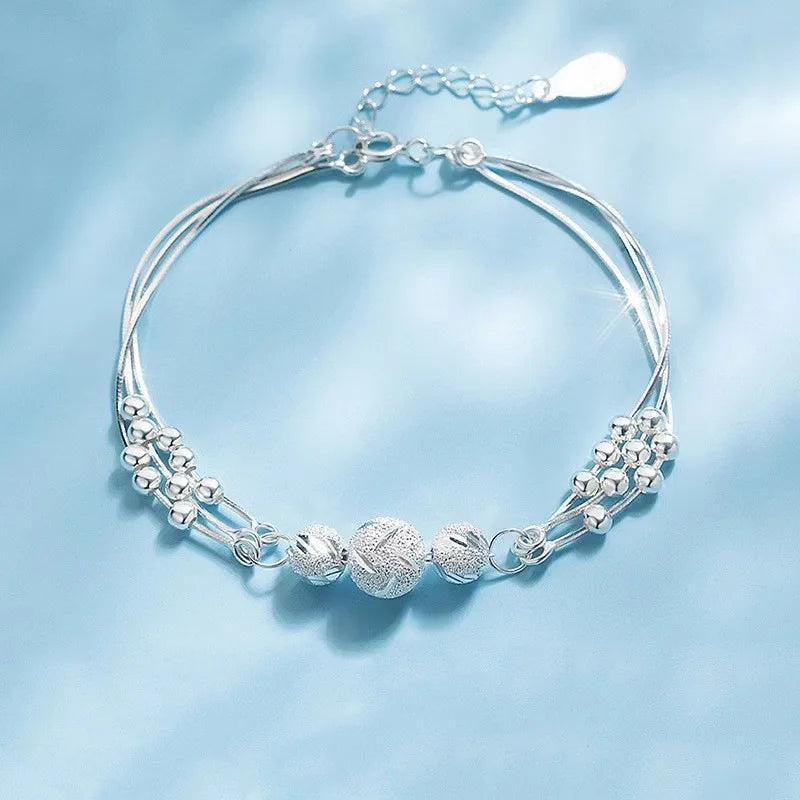 Six imitation diamond silver bracelets from Corporación Turística, featuring sparkling cubic zirconia accents on sleek silver bands.