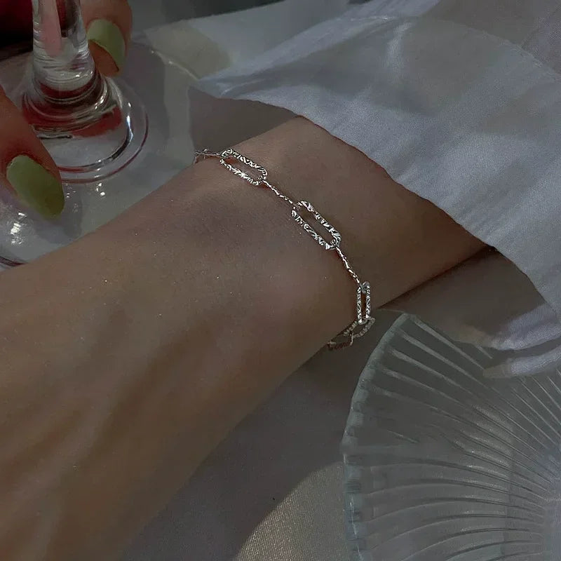 Six imitation diamond silver bracelets from Corporación Turística, featuring sparkling cubic zirconia accents on sleek silver bands.