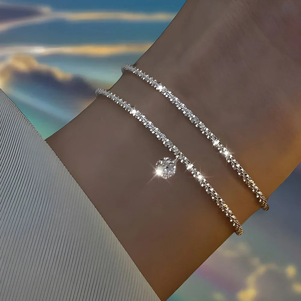 Six imitation diamond silver bracelets from Corporación Turística, featuring sparkling cubic zirconia accents and sleek silver design.