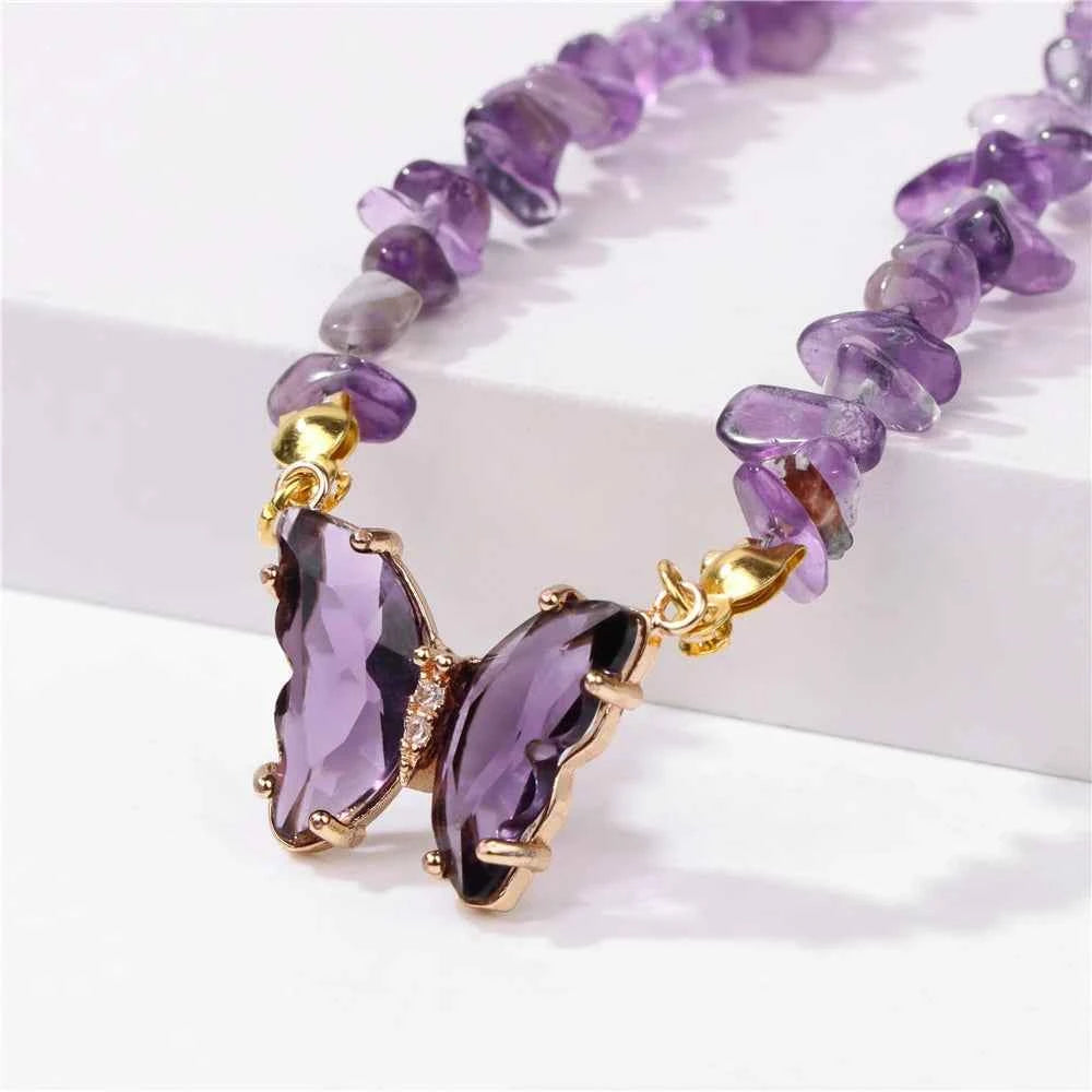 Fashion butterfly crystal collar with purple amethyst stones, stylish jewelry piece by Corporación Turística.