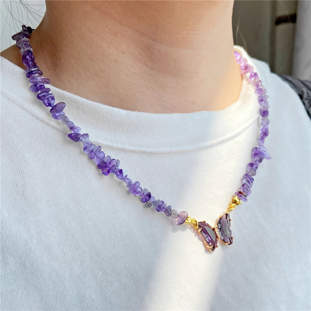 Fashion butterfly crystal necklace with purple amethysts, featuring aquamarine accents, by Corporación Turística.