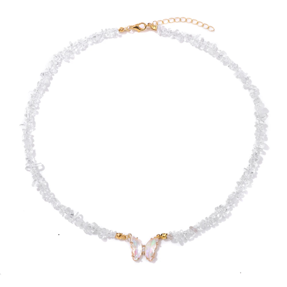 Fashion butterfly crystal necklace with purple amethysts, featuring aquamarine accents, on a stylish jewelry display.