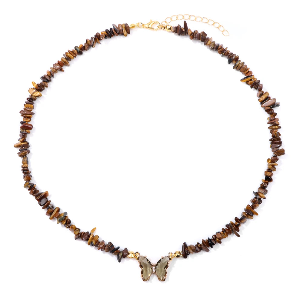 Fashion butterfly crystal collar with purple amethyst stones from Corporación Turística, showcasing elegant jewelry design.