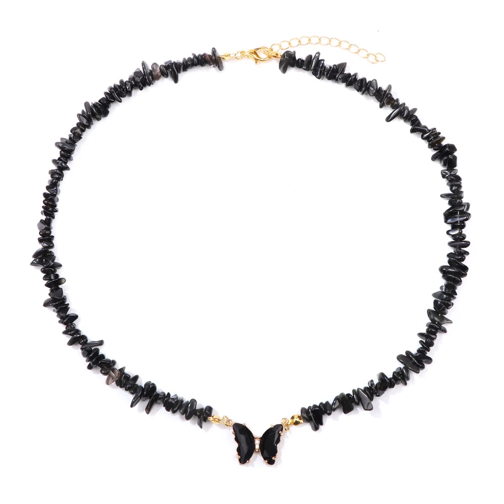 Fashion butterfly crystal necklace featuring purple amethyst stones, crafted by Corporación Turística.