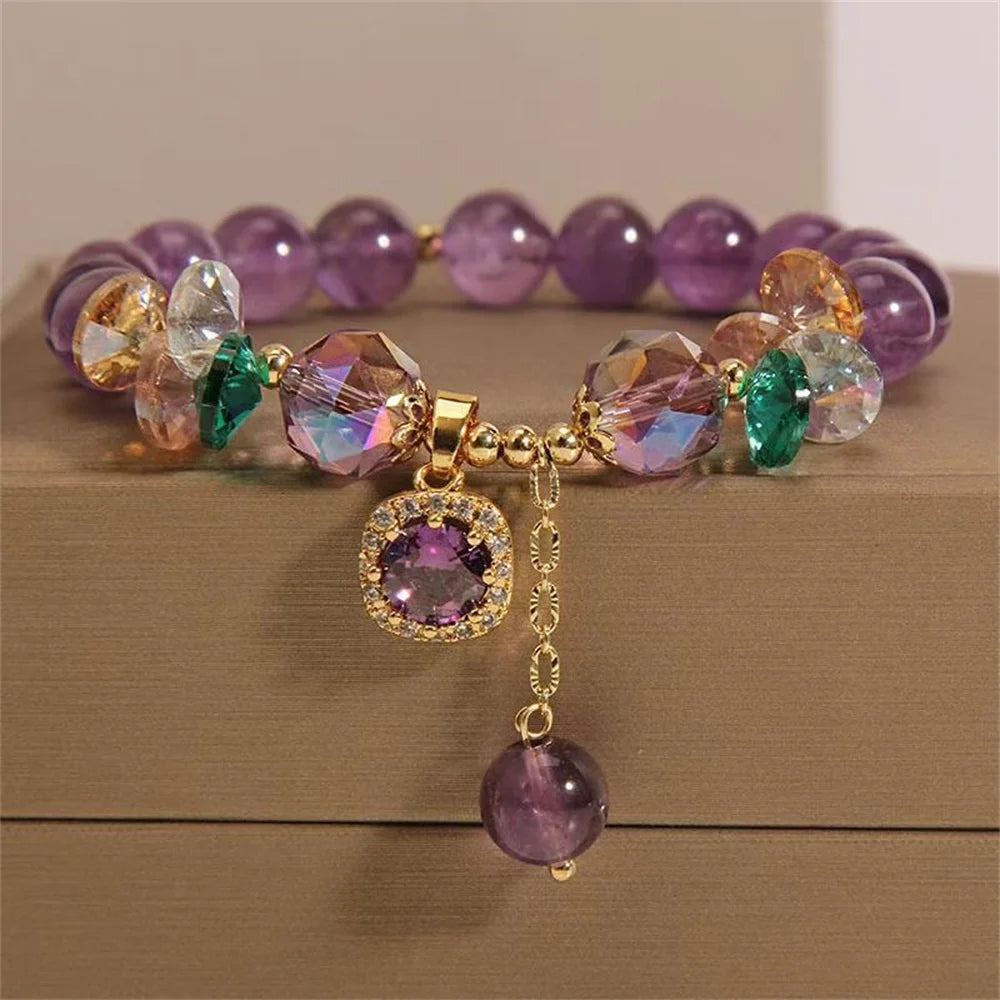 Purple crystal bead bracelet with natural stone beads from Corporación Turística, showcasing a stylish and elegant design.