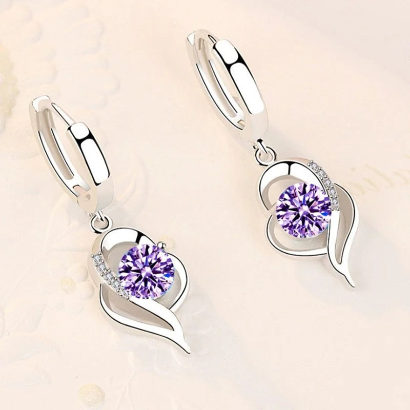 Sterling silver 925 earrings with sparkling crystal cubic zirconia, elegant jewelry by Corporación Turística