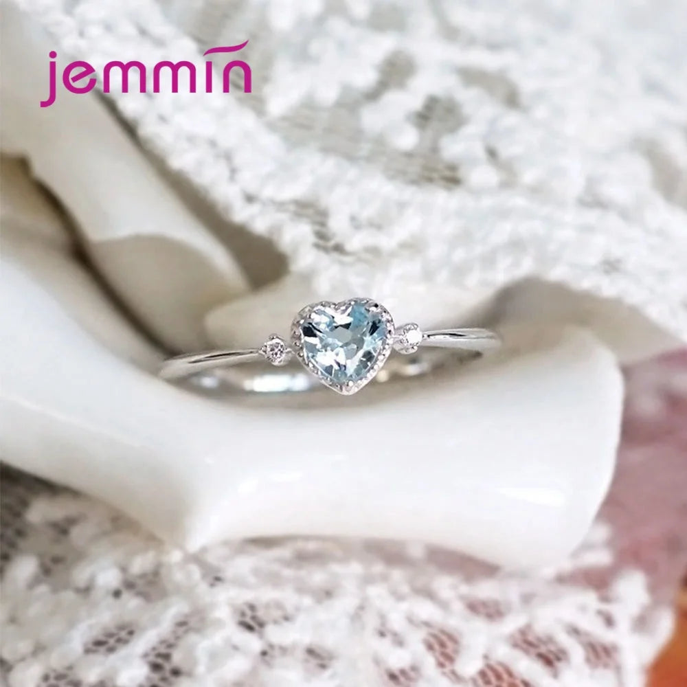 Elegant 100% sterling silver 925 ring from Corporación Turística, displayed on a finger showcasing its polished finish and intricate design.