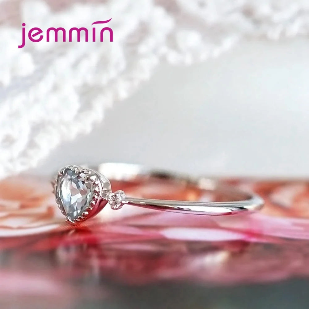 Sterling silver 925 ring from Corporación Turística, featuring a smooth, polished band designed for elegant finger wear.