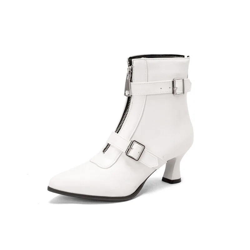 White women's chunky heel ankle boots by Corporación Turística, stylish winter shoes with thick heels and comfortable design.