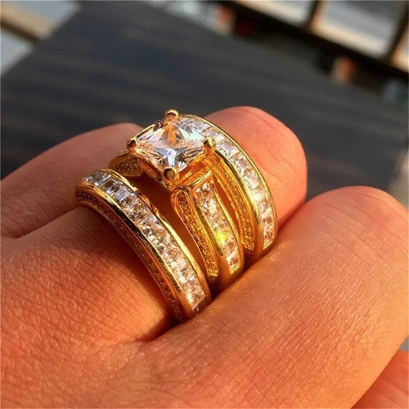 Set of three fashionable 925 sterling silver rings with varied designs, ideal for stylish jewelry collection.