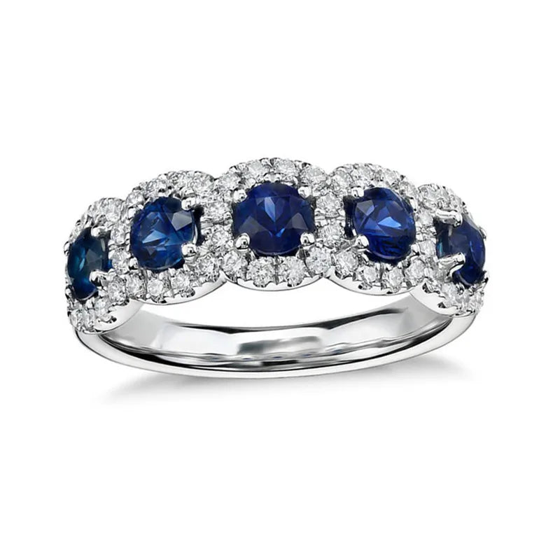 Elegant sterling silver 925 women’s ring with intricate design, showcasing a shiny polished finish and stylish craftsmanship.