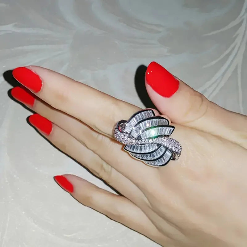 Sterling silver 925 wedding accessory rings from Corporación Turística featuring elegant, polished band designs.