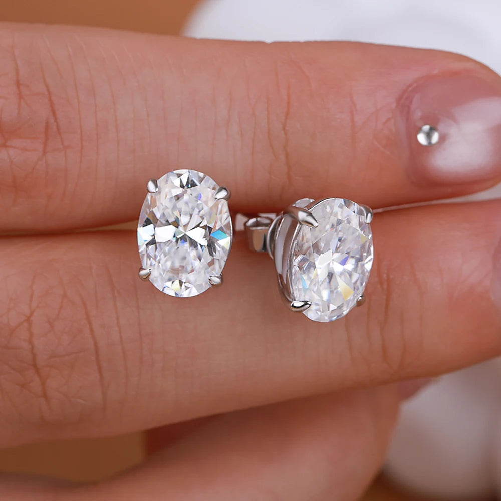 High-quality NKHOG oval moissanite earrings, 1-4 carats, featuring sparkling oval-cut stones set in elegant earrings.