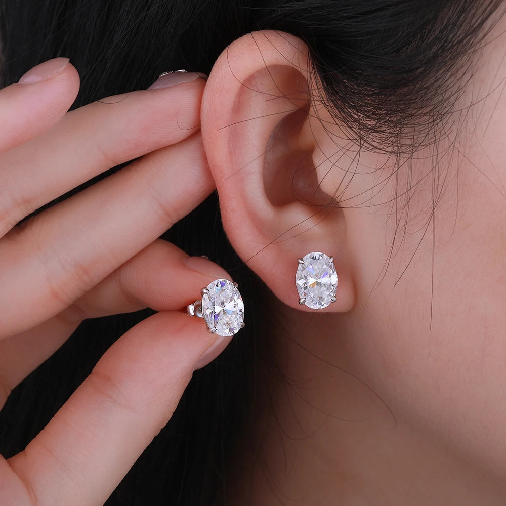 Oval moissanite earrings from Corporación Turística with 1-4 carats, featuring high-quality, sparkling gemstone accents.