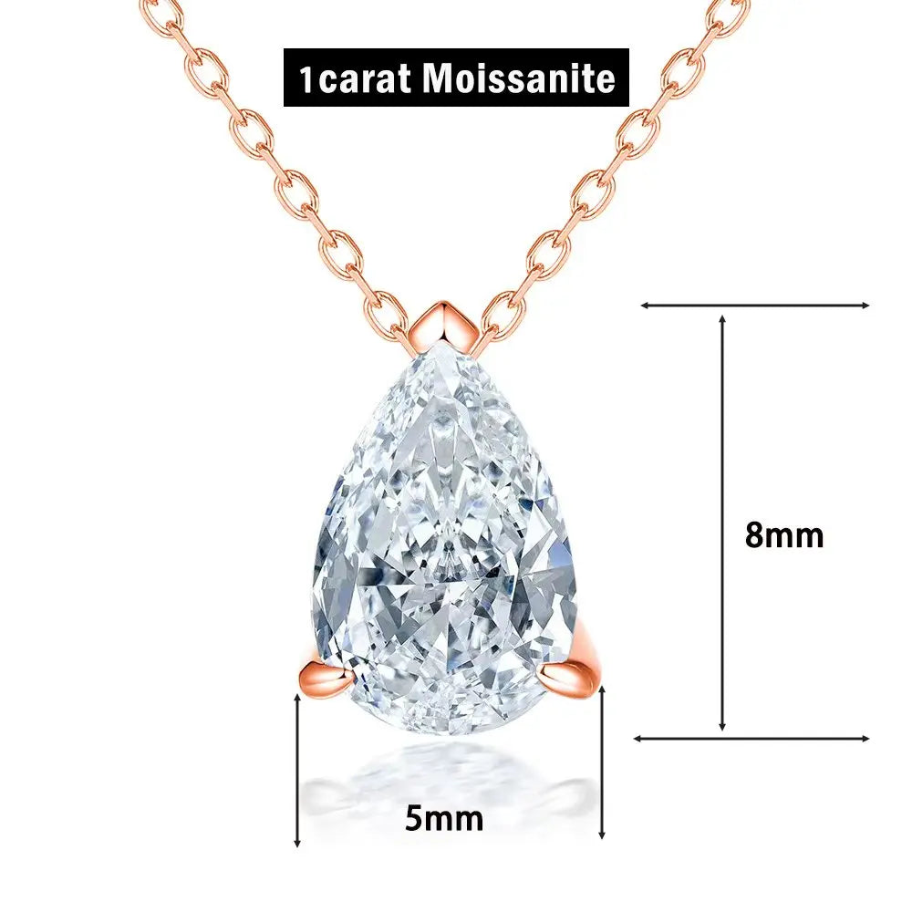 Silver moissanite drop pendant necklace featuring a teardrop-shaped gemstone on a sleek chain.