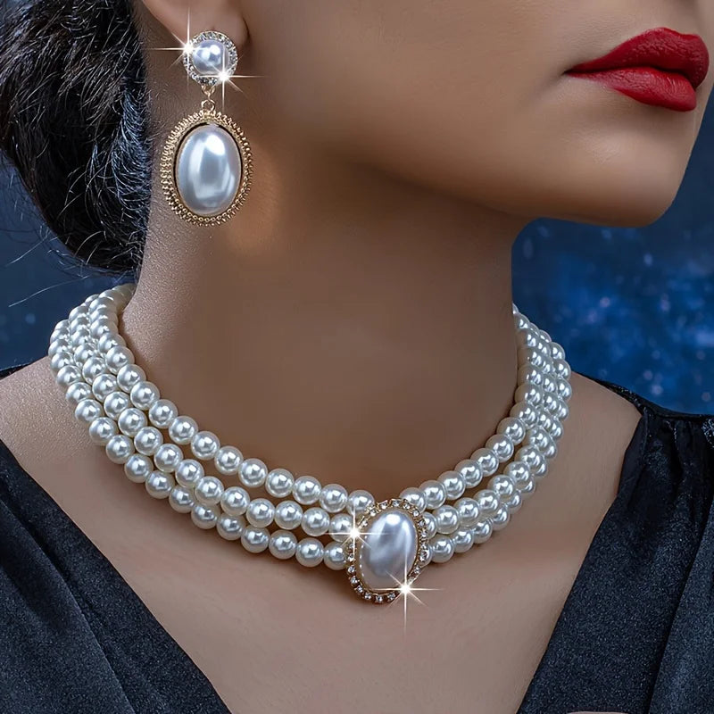 Elegant imitation pearl necklace and matching earrings set from Corporación Turística, featuring classic pearl designs.