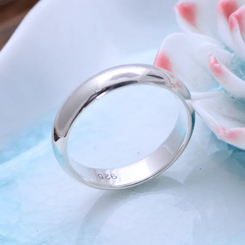 Sterling silver 925 couple's ring by Corporación Turística, featuring a sleek design for romantic pairs.