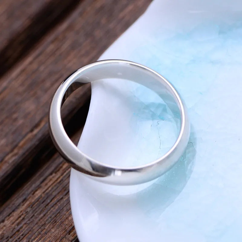 Sterling silver 925 couple's ring by Corporación Turística, featuring a sleek, polished design for romantic jewelry.