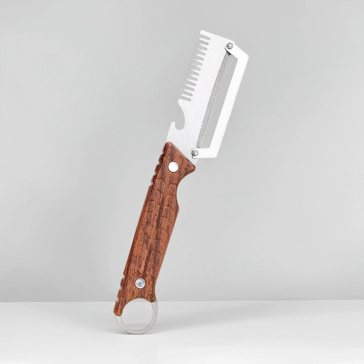 Stainless steel 3-in-1 onion chopper and peeler set by Corporación Turística showing two kitchen tools with sharp blades and ergonomic handles.