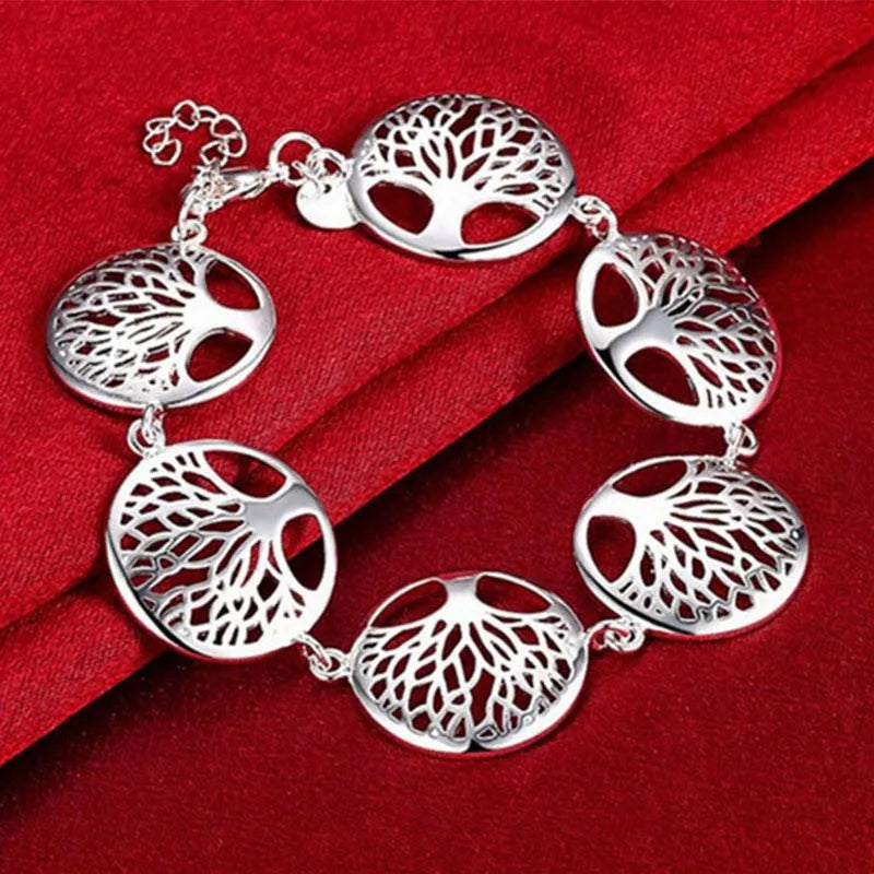 Silver 925 bracelet with detailed tree flower charms, featuring intricate floral design and elegant craftsmanship.