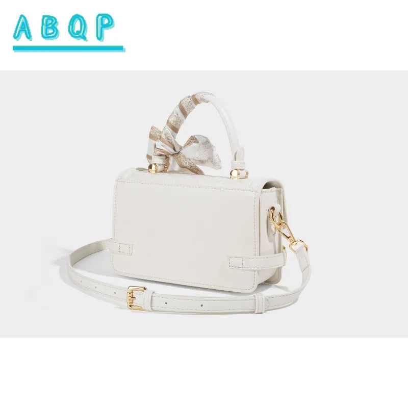 Luxury women's shoulder bag from ABQP by Corporación Turística, featuring a sleek design and premium craftsmanship.