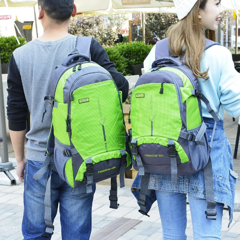 Purple waterproof backpack by Corporación Turística, 25L capacity, durable and spacious for outdoor adventures.