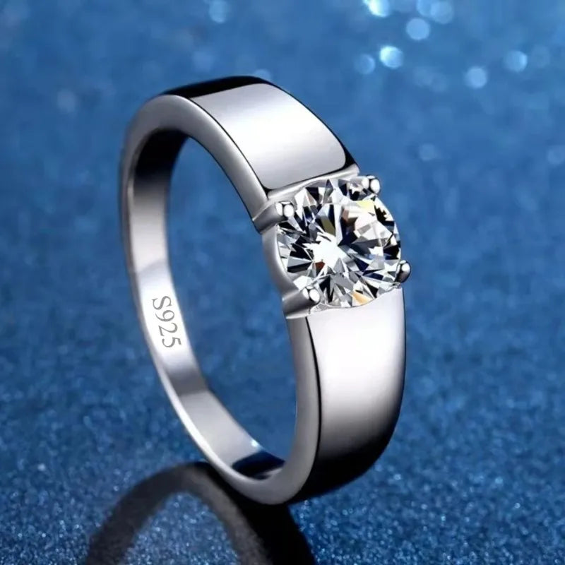 Sterling silver men's ring with 8mm moissanite D VVS gemstone, featuring a sleek design and polished finish.