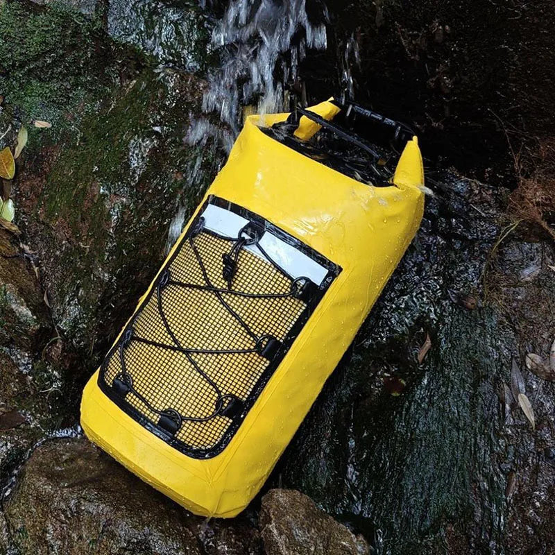 Yellow 40L floating dry bag from Corporación Turística, ideal for kayaking, swimming, and beach activities.