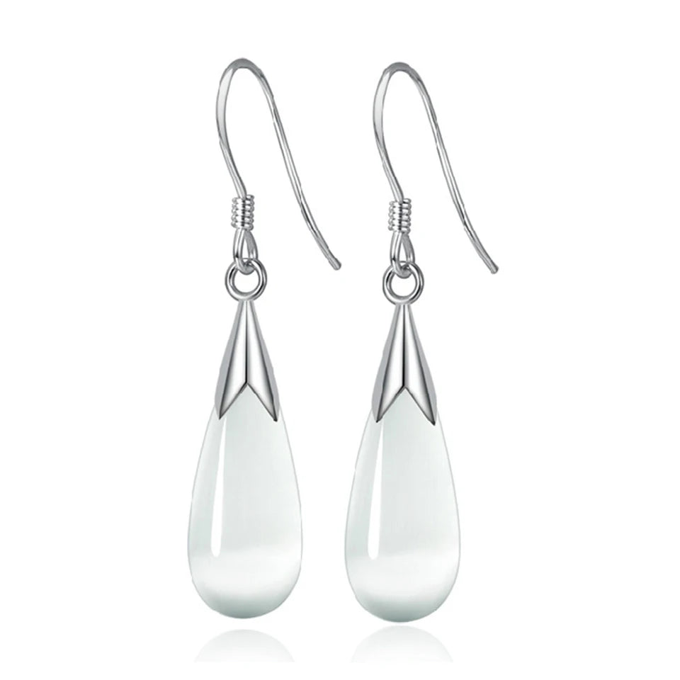 Elegant water drop-shaped zircon earrings for women featuring sparkling gemstones and silver-tone metal detailing.