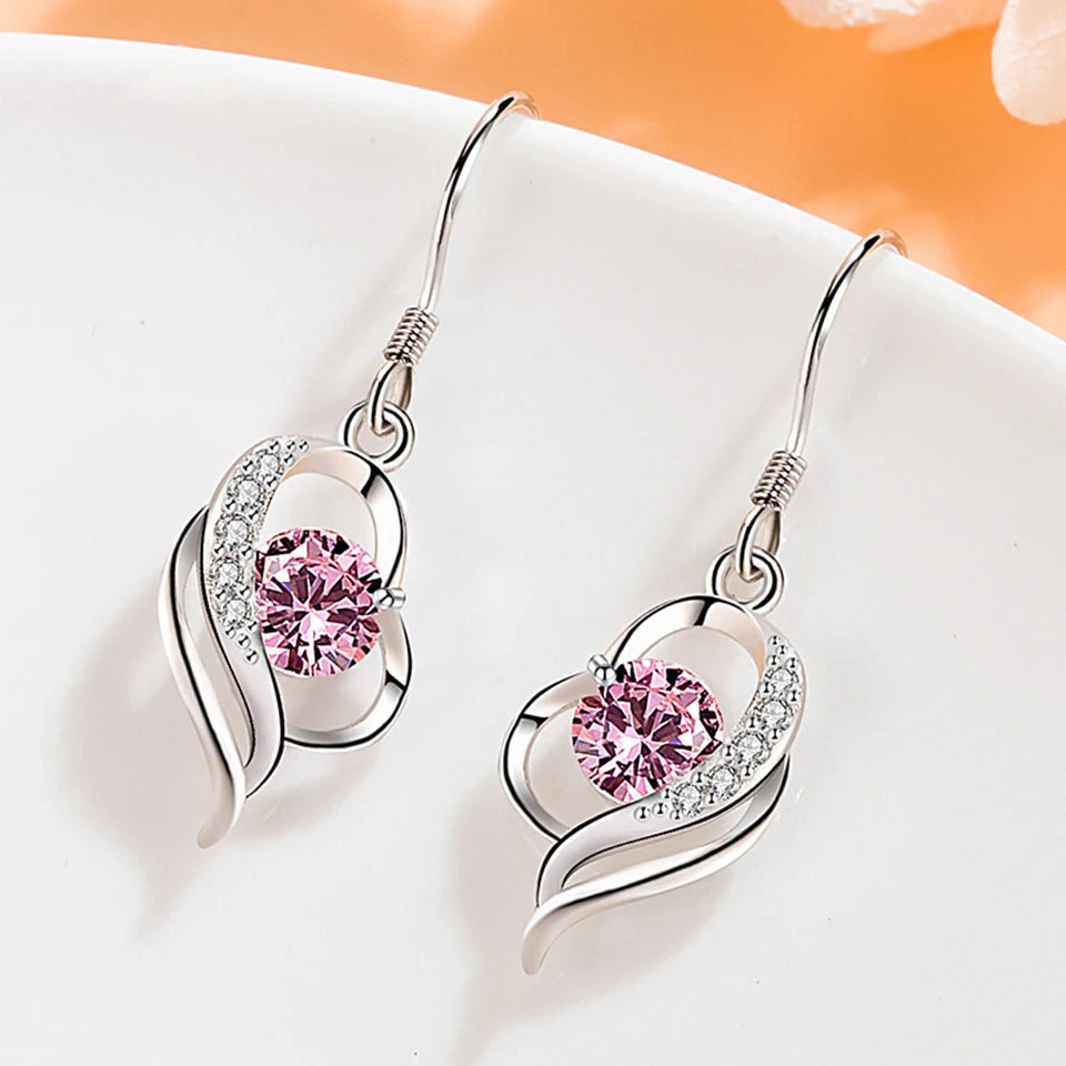 Water drop-shaped cubic zirconia earrings for women, elegant dangle jewelry with sparkling stones.