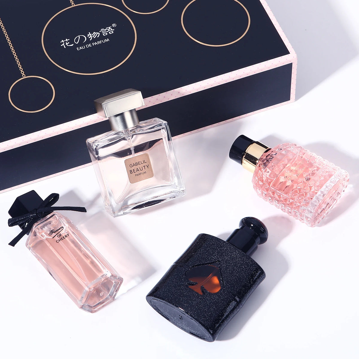 Elegant FloralVerse 4-in-1 perfume gift box by Corporación Turística, featuring four floral-scented perfume bottles in a stylish package.